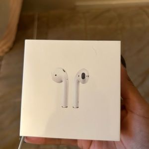 Brand new AirPods w/ charging case